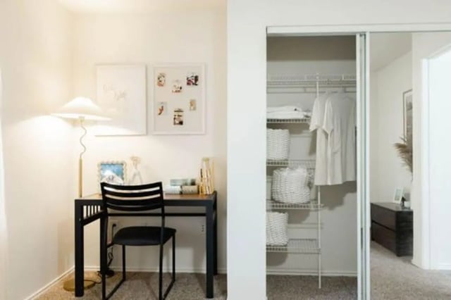 Desk chair lamp framed pictures closet storage bedroom at The Lodge Apartments in San Marcos Student Accommodation