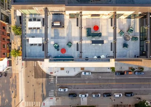 Rooftop seating areas tables and fire pit outdoor space at Vic Village South in Ann Arbor Student Accommodation