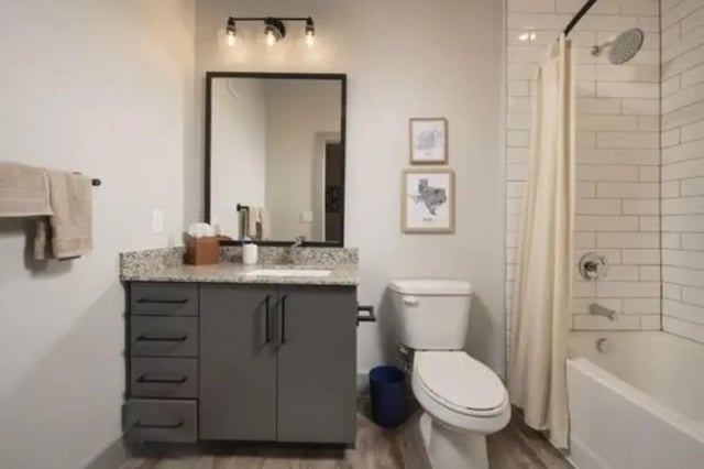 Gray vanity white toilet shower bathtub bathroom at The Wyatt in Lubbock Student Accommodation