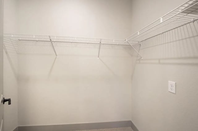 Wire shelves on wall and electrical outlet closet at The Wyatt in Lubbock Student Accommodation