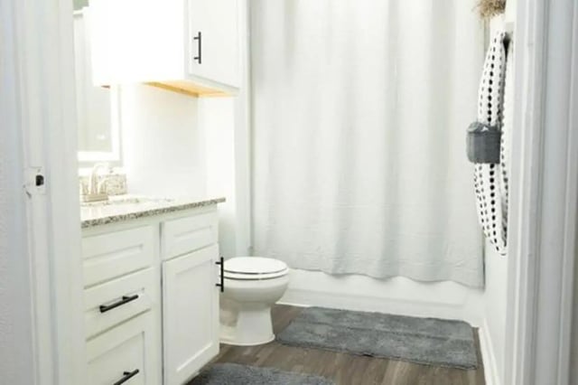Vanity toilet shower curtain gray rugs bathroom at Villagio Apartments in San Marcos Student Accommodation
