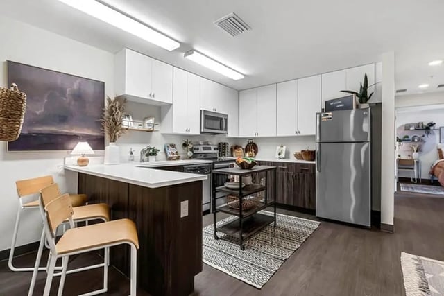 Modern kitchen with island bar and seating kitchen at Social 28 in Gainesville Student Accommodation