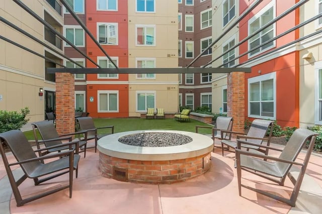 Courtyard with chairs and fire pit exterior at The Hayward Student Living in Eugene Student Accommodation