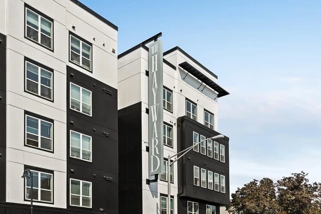 Modern apartment building with black and white exterior exterior at The Hayward Student Living in Eugene Student Accommodation