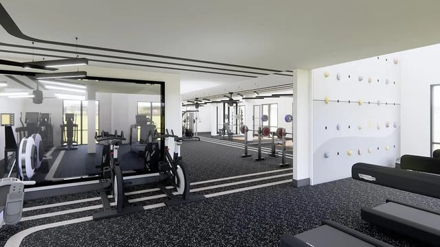 Gym equipment treadmills bikes weights rock climbing wall gym at The Hayward Student Living in Eugene Student Accommodation