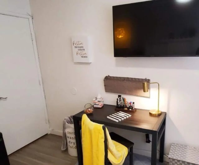 Desk with lamp and wall art study area at Capri Eugene Apartments in Eugene Student Accommodation