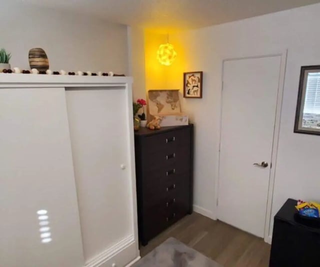 Closet dresser map picture yellow lamp bedroom at Capri Eugene Apartments in Eugene Student Accommodation
