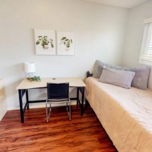 Desk chair bed art student room at Capri at Isla Vista Apartments in Isla Vista Student Accommodation