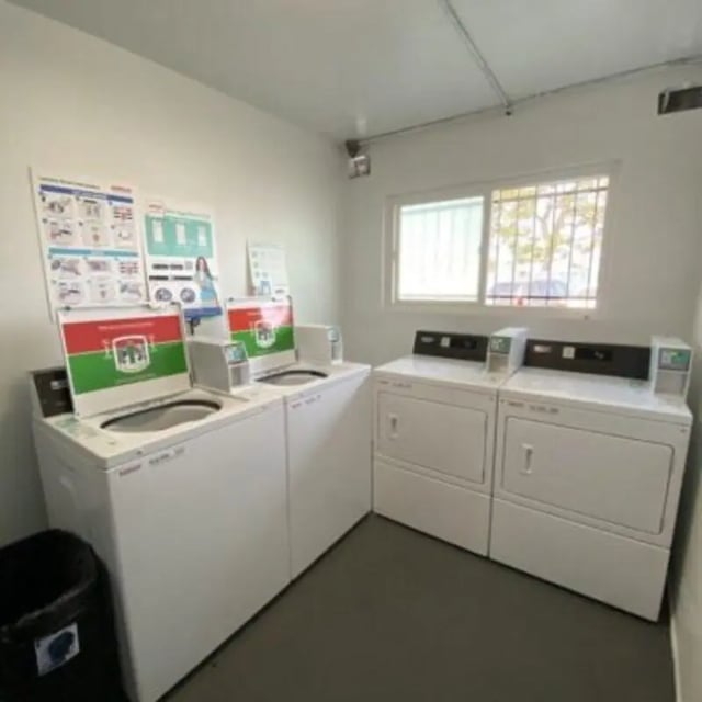 Washers and dryers with instructional posters Laundry room at Capri at Isla Vista Apartments in Isla Vista Student Accommodation