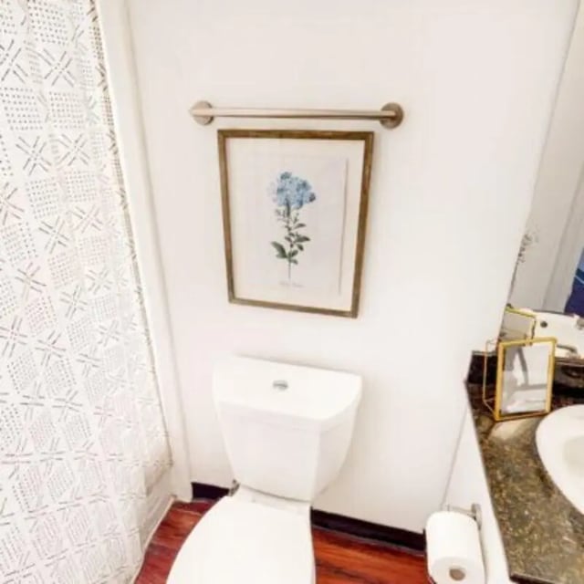 Toilet framed art and shower curtain bathroom at Capri at Isla Vista Apartments in Isla Vista Student Accommodation