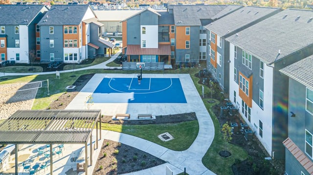 Basketball court and volleyball court exterior at Aspen Heights Fayetteville in Fayetteville Student Accommodation