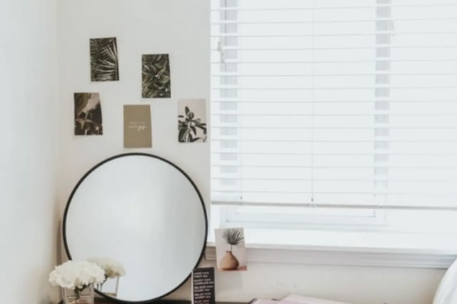 Round mirror botanical prints blinds bedroom at Alpine Village in Provo Student Accommodation