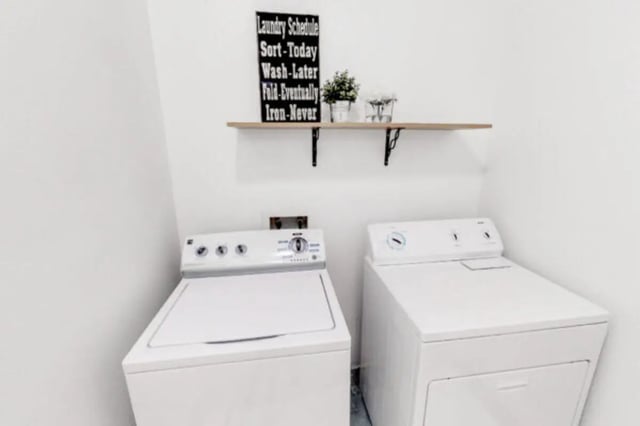 Two white washers and dryer Laundry room at Alpine Village in Provo Student Accommodation