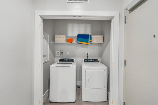 Washer dryer and shelf laundry room interior at Aspen State College in State College Student Accommodation