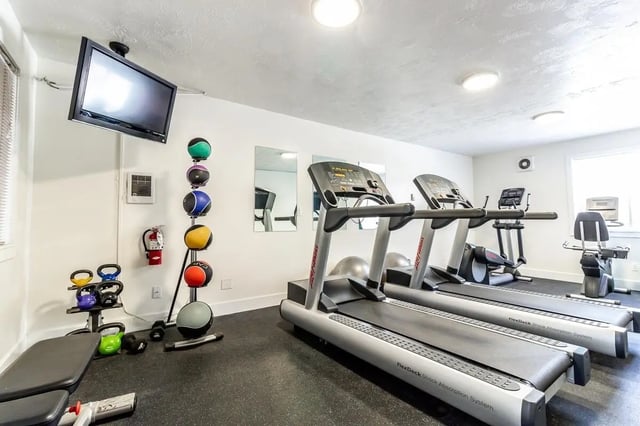 Treadmills medicine balls weights and bench gym at Birch Plaza and Birchwood Apartments in Rexburg Student Accommodation