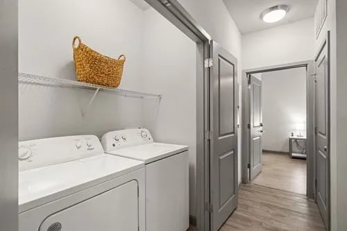 Washer dryer and basket laundry area at Altitude Apartments in Houston Student Accommodation