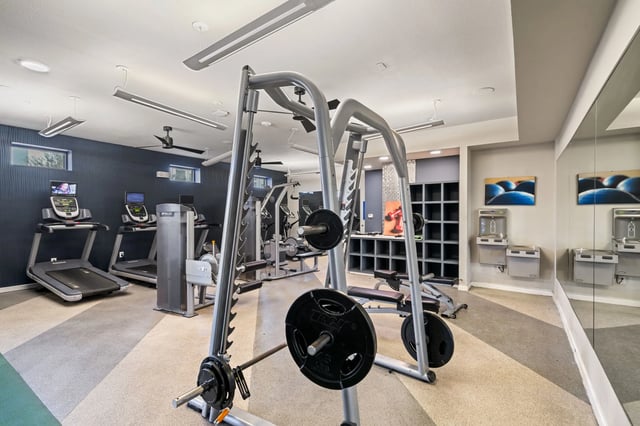 Weight rack treadmills and lockers gym at Altitude Apartments in Houston Student Accommodation