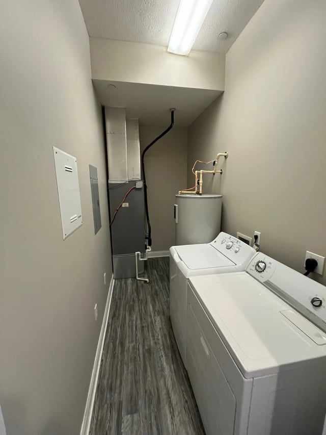 Washer dryer water heater furnace laundry area at 7 Ten Apartments in Bloomington Student Accommodation