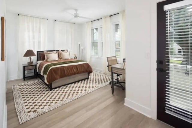 Bed desk chair rug and lamp bedroom at Prospect Row in Tallahassee Student Accommodation
