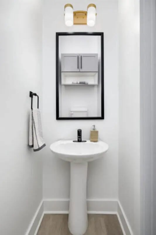 Sink cabinet towel rack with mirror bathroom at Prospect Row North in Tallahassee Student Accommodation