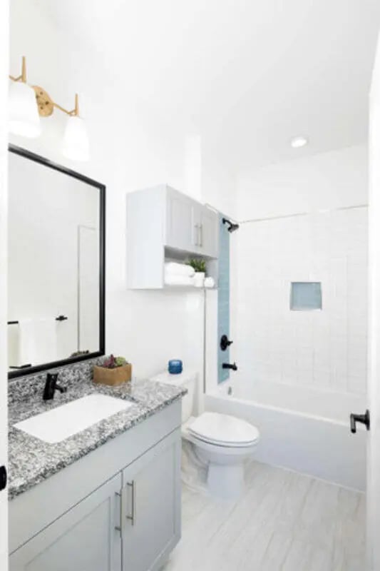 Vanity toilet bathtub and shower bathroom at Prospect Row North in Tallahassee Student Accommodation
