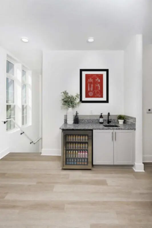 Mini fridge sink countertop and art kitchen at Prospect Row North in Tallahassee Student Accommodation