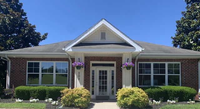 Brick building with entryway and windows exterior at Eagles Landing Apartments in Cookeville Student Accommodation
