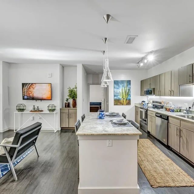 Modern living area and kitchen combo living area kitchen at Aspire Tucson Apartments in Tucson Student Accommodation