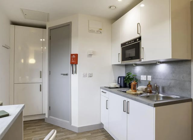 Modern studio kitchen with microwave and sink Kitchen at The Bridge Phase II in Newcastle Upon Tyne Student Accommodation