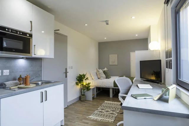 Kitchen bed study area and TV at The Bridge Phase II in Newcastle Upon Tyne Student Accommodation