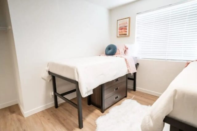 Two beds with drawers and rug bedroom at Cedar Flats Student Housing in St. George Student Accommodation