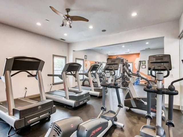 Treadmills and ellipticals gym equipment fitness room at Campus Pointe in Kent Student Accommodation