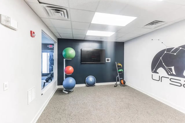 Fitness balls television and wall art gym at URSA in Waco Student Accommodation