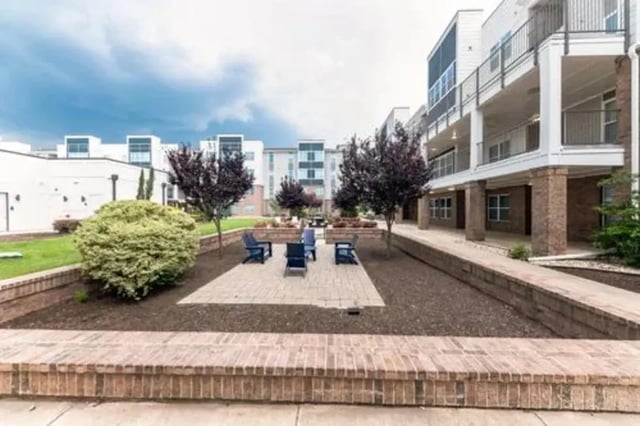 Patio with chairs and trees exterior at URSA in Waco Student Accommodation