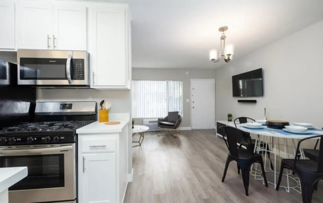 Kitchen living and dining area interior at USC Student Housing: Heritage 2353 in Los Angeles Student Accommodation