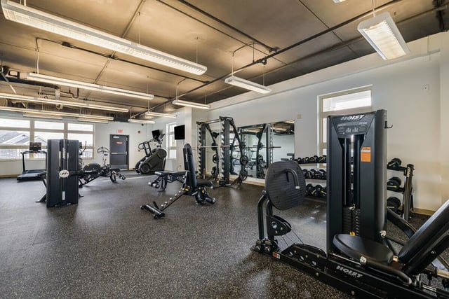 Gym equipment treadmills weight machines and dumbbells gym at 865 East in Harrisonburg Student Accommodation