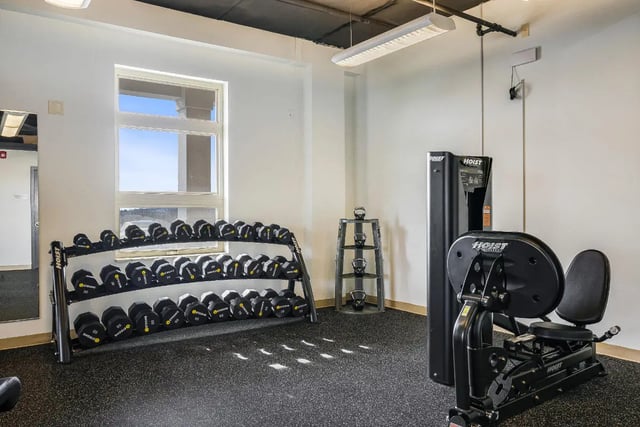 Dumbbell racks kettlebell stand weight machine gym at 865 East in Harrisonburg Student Accommodation