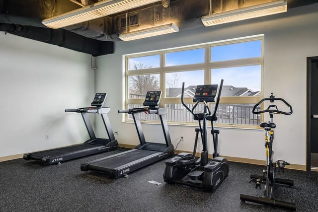 Treadmills elliptical and stationary bike gym fitness area at 865 East in Harrisonburg Student Accommodation