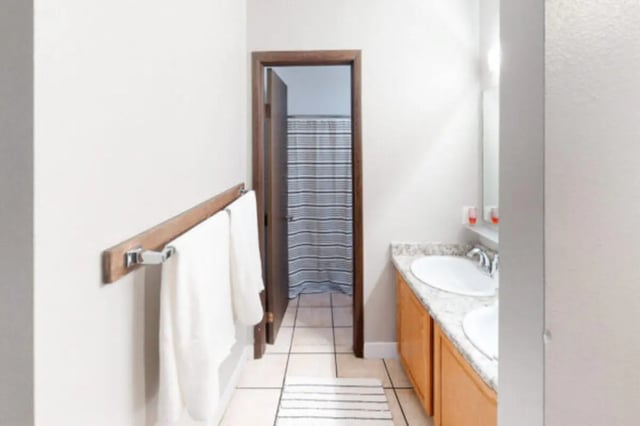 Two sinks vanity and shower curtain Bathroom at Centennial Apartments in Provo Student Accommodation
