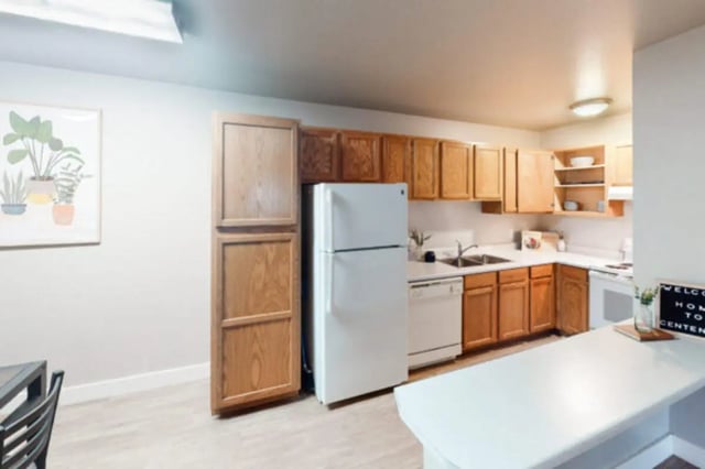 Refrigerator cabinets sink dishwasher kitchen counter kitchen at Centennial Apartments in Provo Student Accommodation