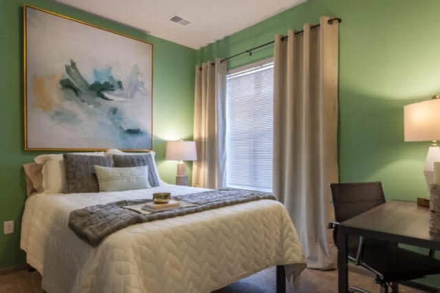 Bed with artwork desk and lamp bedroom at The Lodge at Allendale in Allendale Student Accommodation