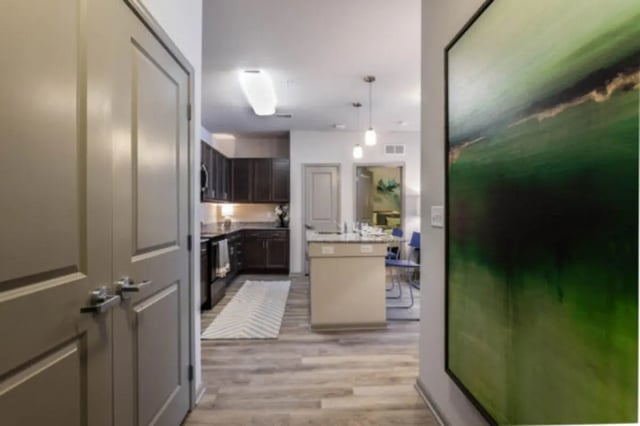 Kitchen with island and dining area at The Lodge at Allendale in Allendale Student Accommodation