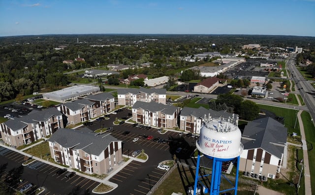 Apartment buildings and water tower exterior at Eight Thirty Water Tower Apartments in Big Rapids Student Accommodation