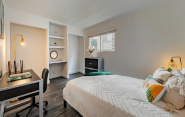 Desk chair shelving and bed bedroom at Victory at Burcham Woods (731) in East Lansing Student Accommodation