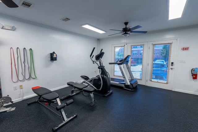 Treadmill elliptical weight bench resistance bands workout room at Campus Row in Tallahassee Student Accommodation