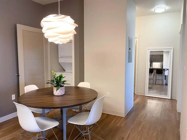 Dining table with chairs and plant dining area at 940 North in Spokane Student Accommodation