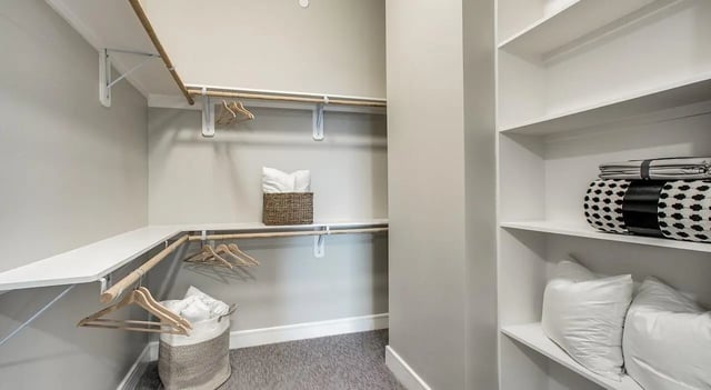 Walk in closet with shelves baskets and hangers Closet at 940 North in Spokane Student Accommodation
