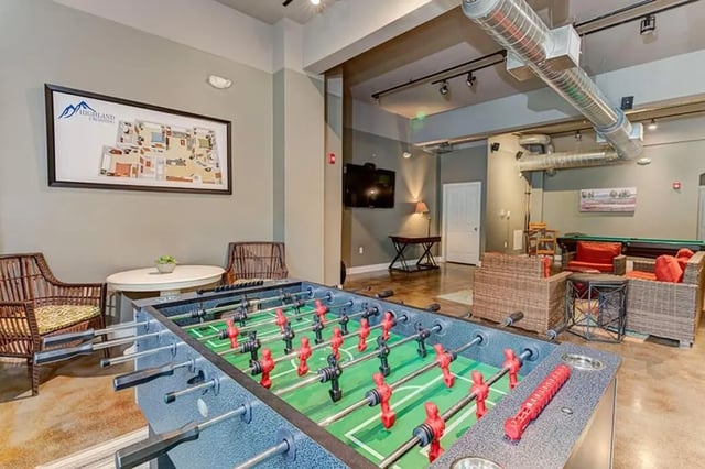 Foosball table billiard table lounge area lounge living room at Boone Student Living in Boone Student Accommodation