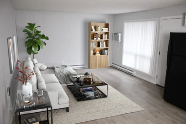 Sofa bookshelf coffee table rug living room at Cougar Ridge Apartments in Pullman Student Accommodation
