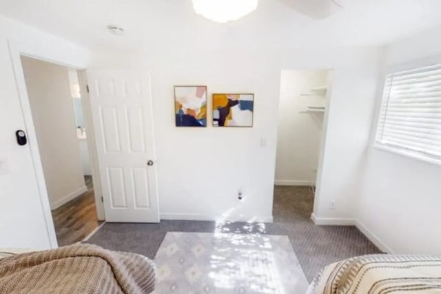 Two beds abstract art open closet bedroom at Glenwood Apartments in Provo Student Accommodation